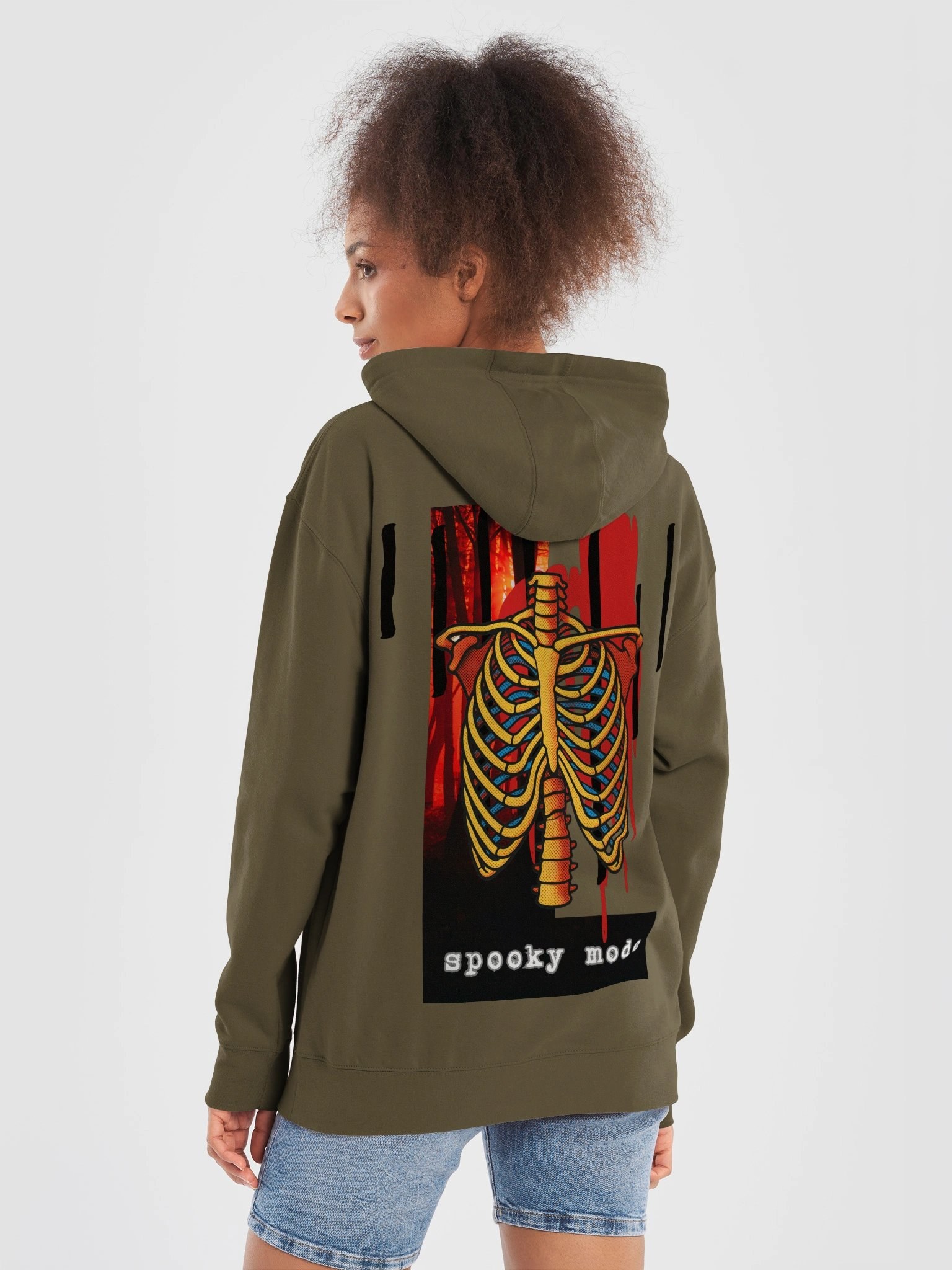 Spooky Mode Premium Hoodie — Bone Jungle artwork worn in the wild